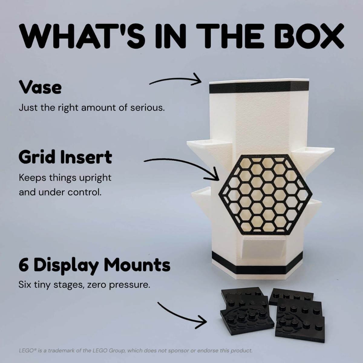 Image showing what’s included with the LEGO compatible minifigure display vase: a geometric black and white vase, hexagonal grid insert for holding botanical stems, and six figure mounts. Arrows and labels highlight each component in a clean layout.